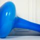 Flattened blown glass corolla vase