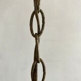 Amber polished glass and pearl suspension