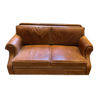 Brown braided leather sofa
