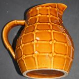 Pitcher in faience of saint clement