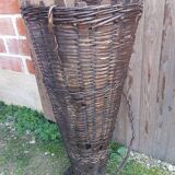 Old grape pickers basket woven wicker vintage wine vines decoration