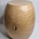 Brutalist monoxyle stool in solid mango wood with an organic shape.