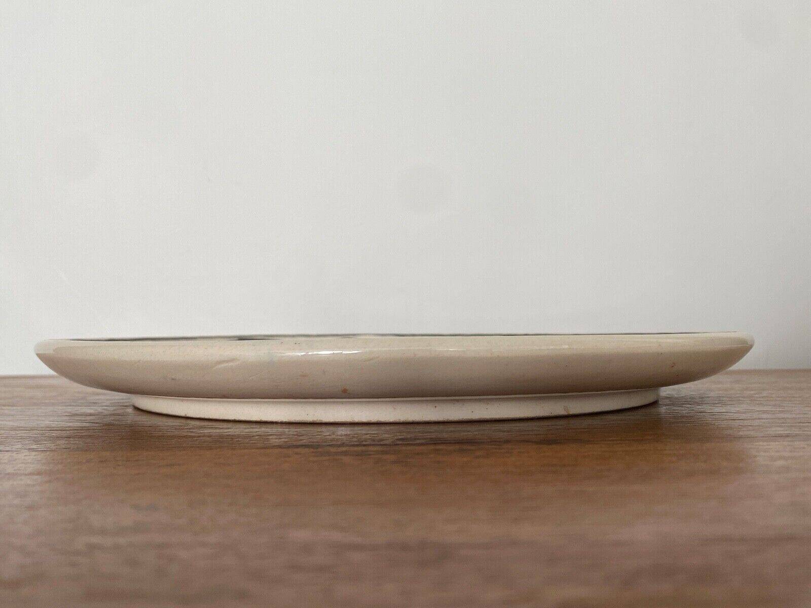 Iznik dish decorated with CB 20th century monogram caravel