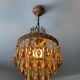 Vintage chandeliers with amber glass tassels and drops