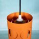 Vintage orange suspension light in a 1970s space age style.