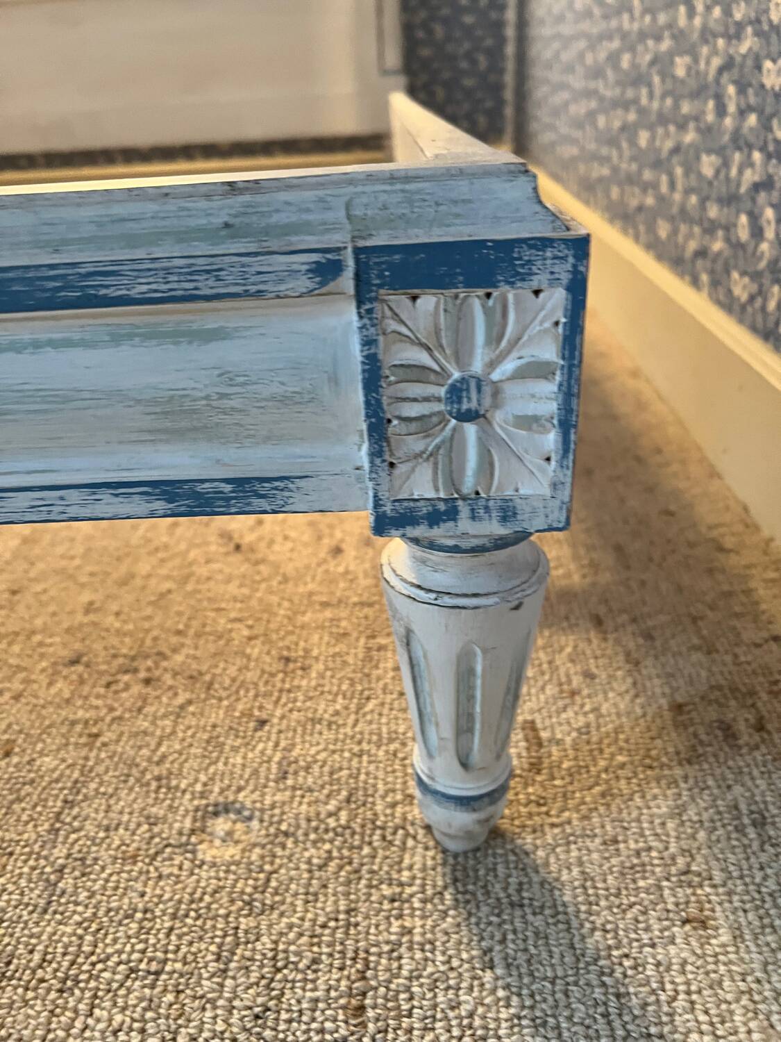 White wooden cane bed