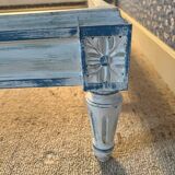 White wooden cane bed