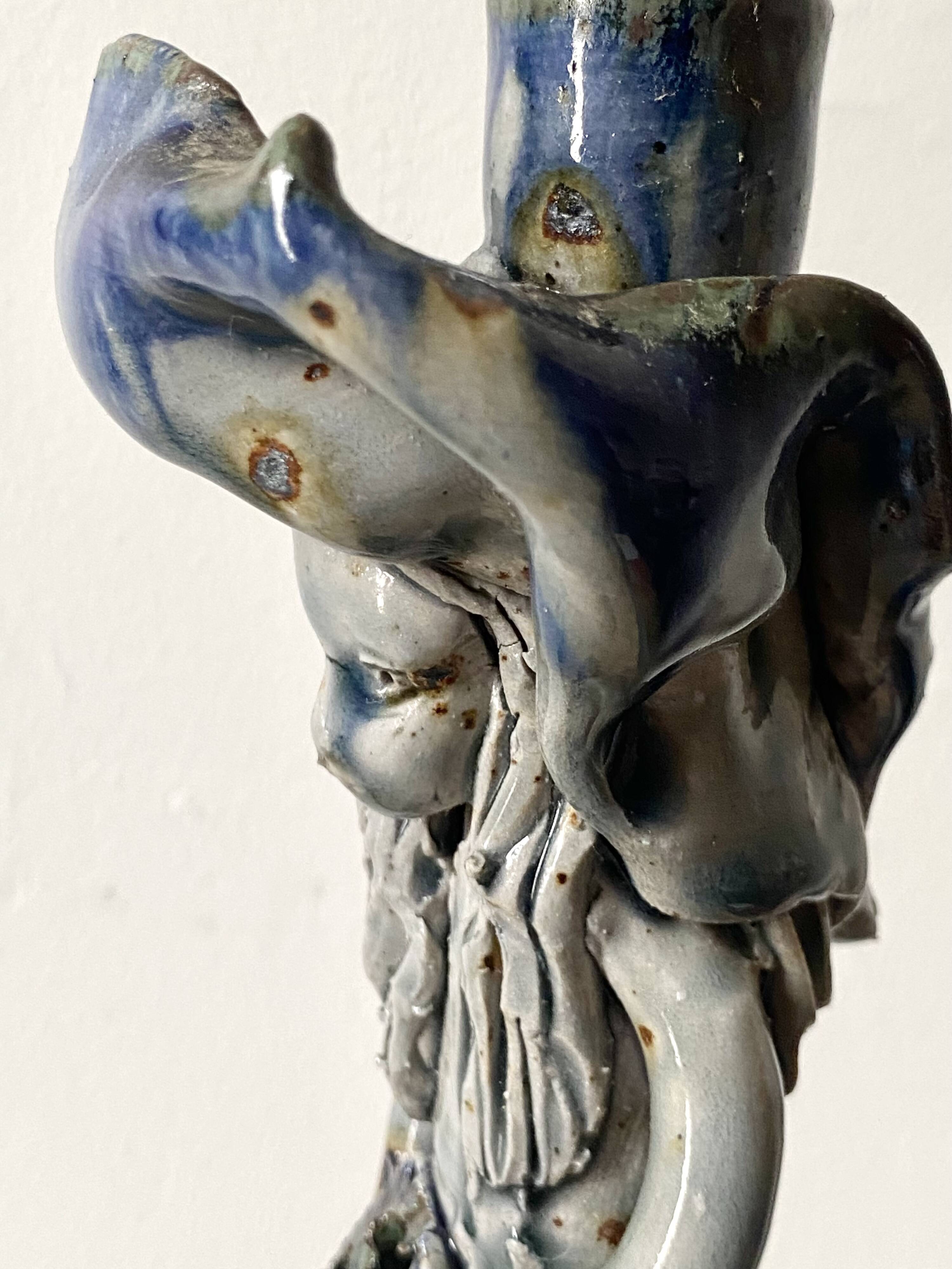 Anthropomorphic ceramic candlestick