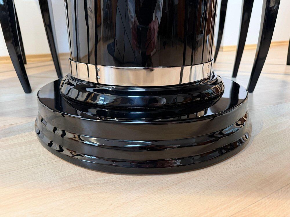 Art Deco dining table in black piano lacquer & metal, 1930