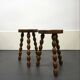 Pair of turned stools in brutalist style