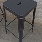 Pair of black metal stools