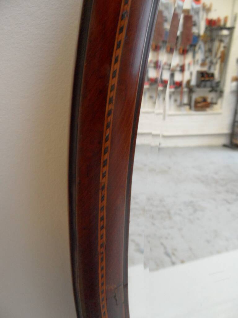 Antique mahogany oval mirror