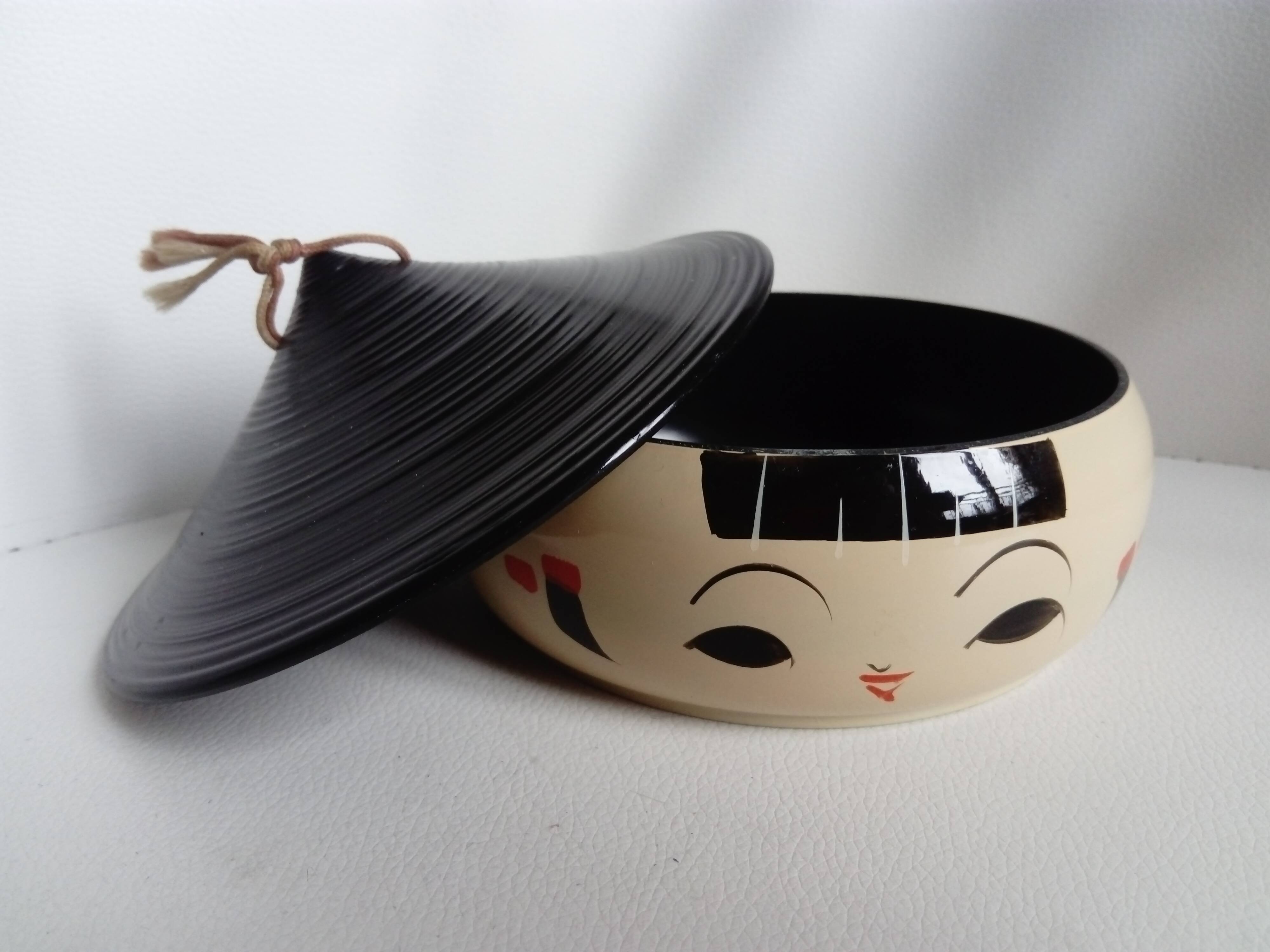Vintage covered box in the shape of a kokeshi.Japan