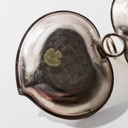 Vintage 1960s silver-plated catchall, double heart shell with ring handle.