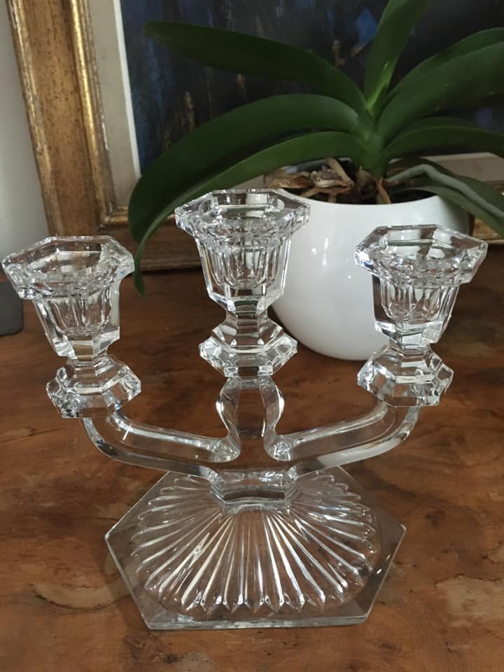 Three-pointed glass candlestick