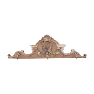 Carved wooden pediment