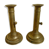 Pair of candlesticks a push brass