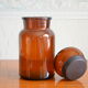 Amber vintage glass apothecary pot, cabochon lid
