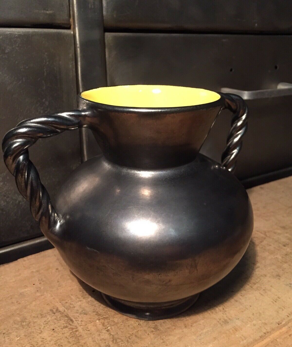 Iridescent black and yellow ceramic vase