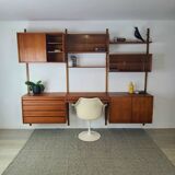 Danish wall-mounted bookshelf designed by Poul Cadovius, Scandinavian design.