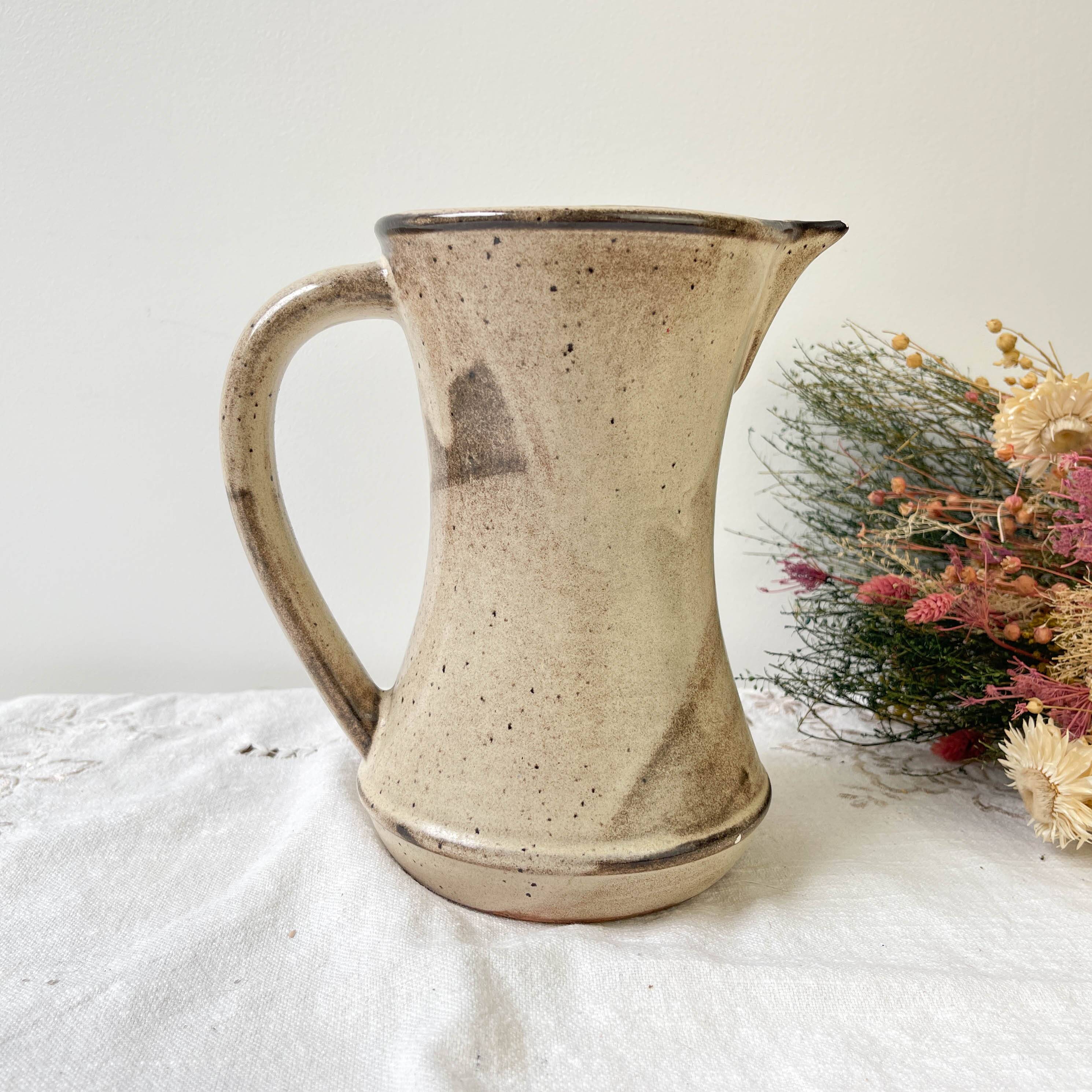 Ceramic pitcher from Les grottes dieulefit with floral pattern from the 1970s