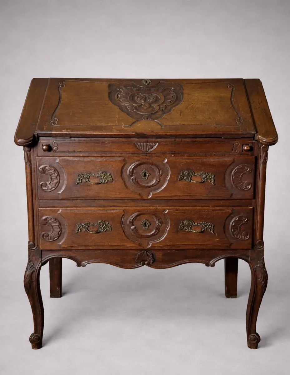 Antique solid wood secretary richly carved, in the Louis XV style.
