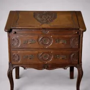 Antique solid wood secretary richly carved, in the Louis XV style.