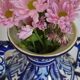 White hand-painted ceramic vase with blue patterns