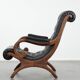 Fauteuil chesterfield en cuir de vachette noir classique et confortable