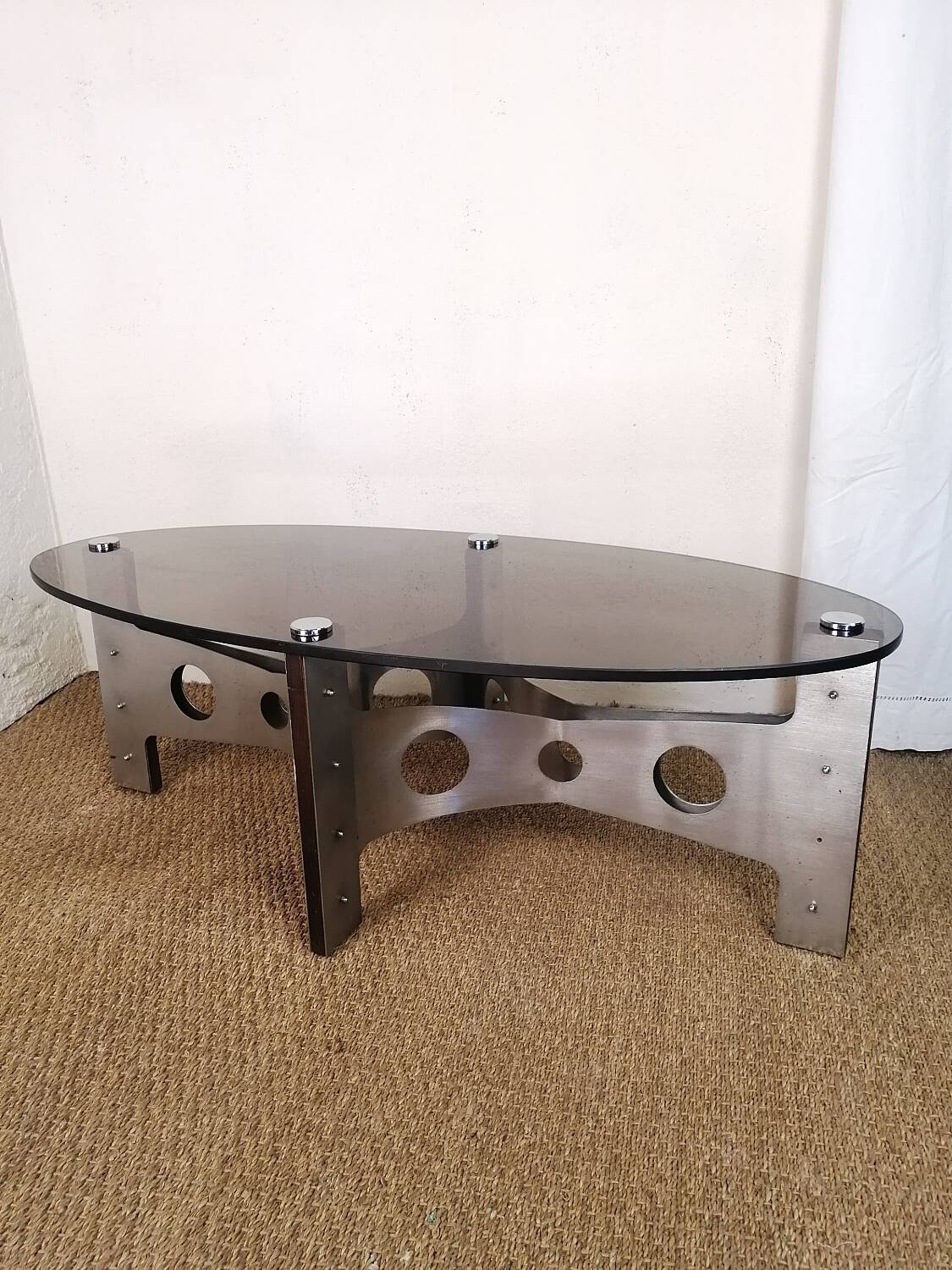 Vintage design coffee table in brushed aluminum and glass top.