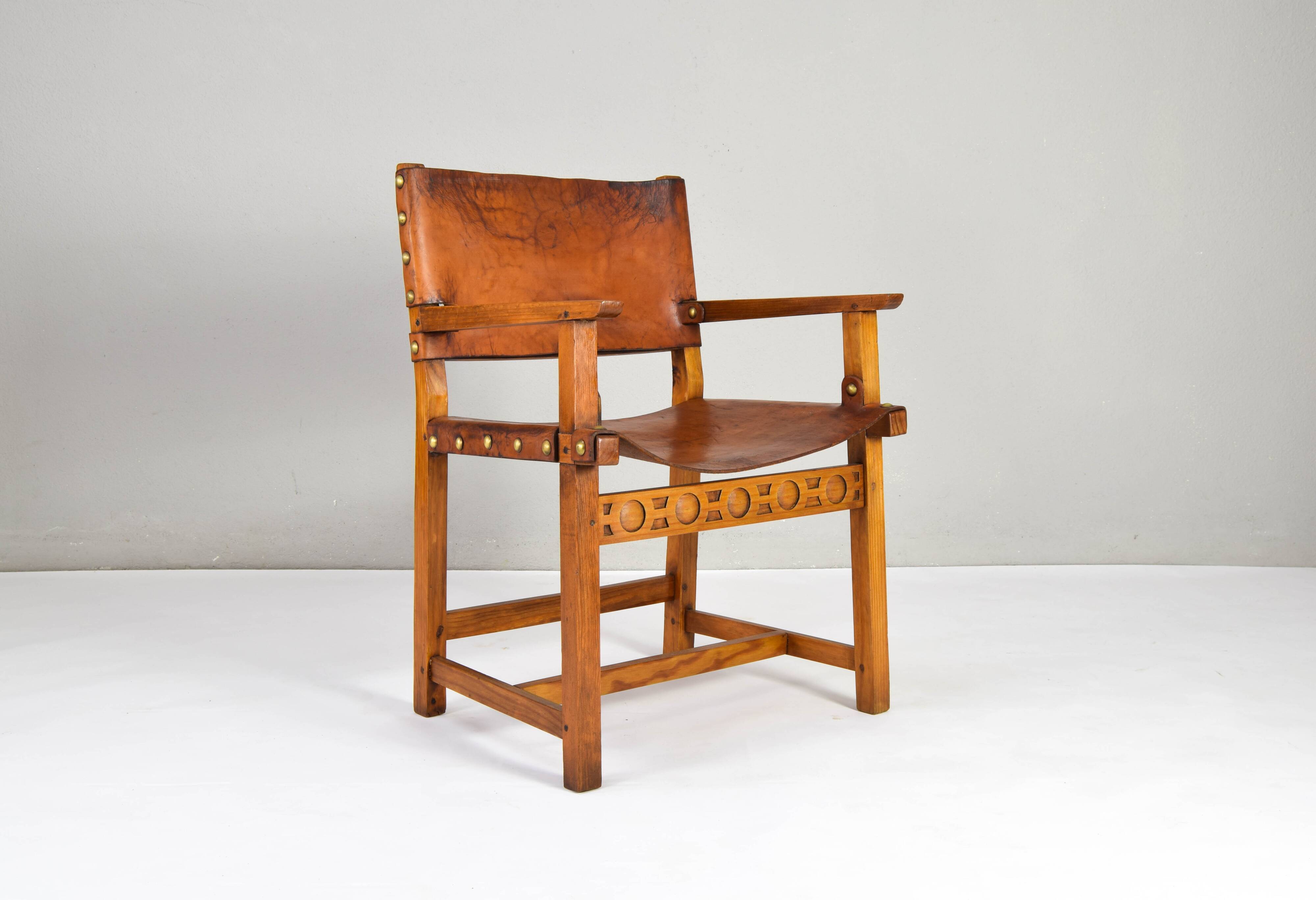 19th century oak and cognac leather brutalist castellana spanish armchair