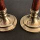 Pair of brass and mahogany wood candle holders