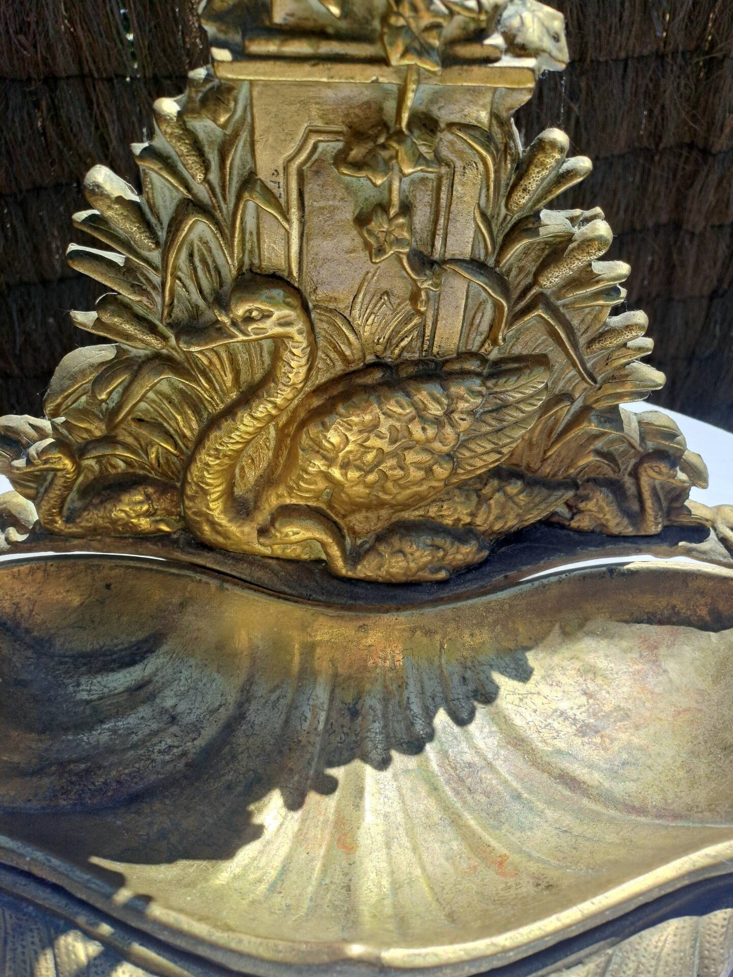 Bronze and brass umbrella stand decorated with a swan.