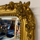 Large Napoleon III mirror with wooden gilded frame, 19th century, 200 cm.