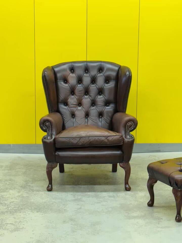 Dark Brown leather chesterfield wing chair with Ottoman