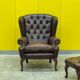 Dark Brown leather chesterfield wing chair with Ottoman