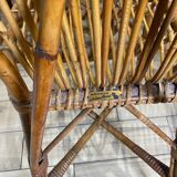 3 armchairs and two bent rattan chairs Audoux & Minnet