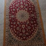 Red and ivory Persian-inspired rug 180 x 100 cm