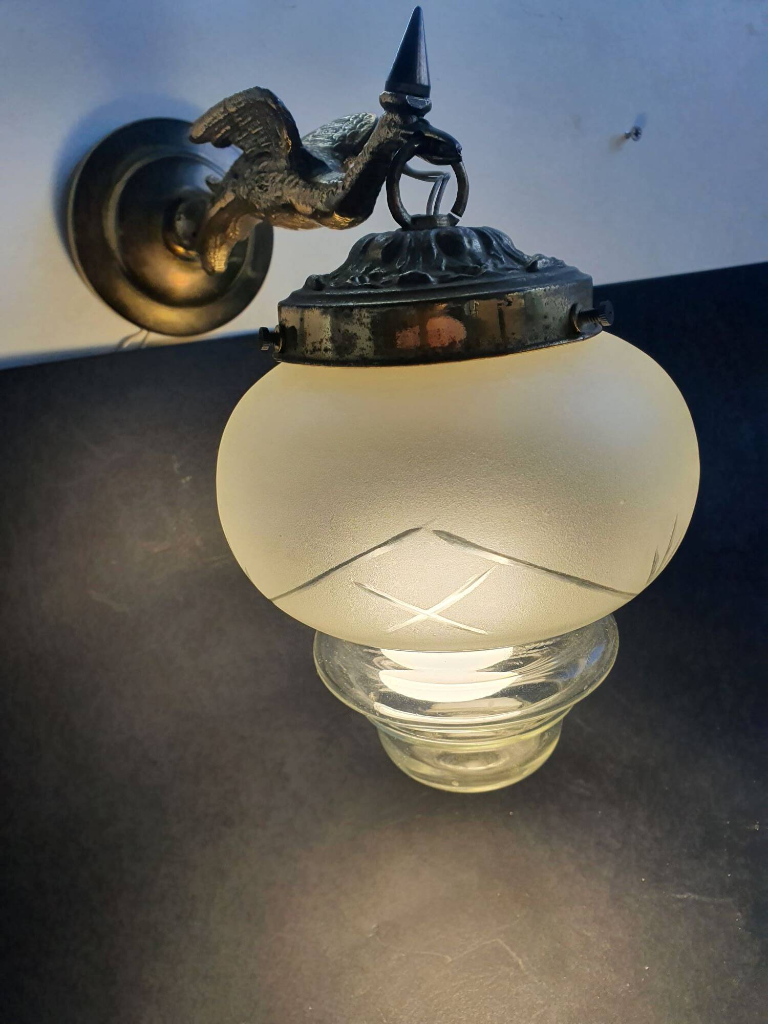 Pair of antique bronze wall sconces