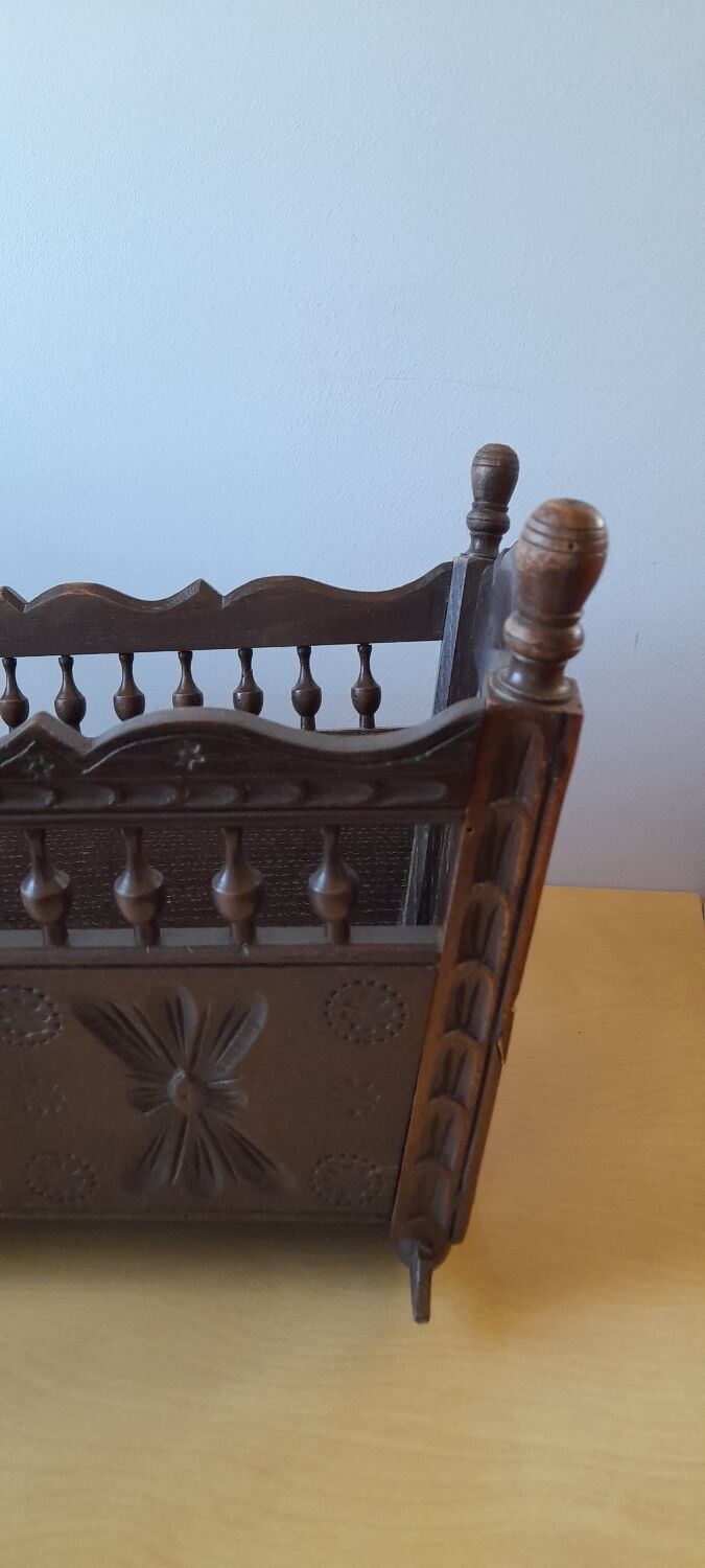 Carved wooden dolls cradle