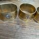 6 brass napkin rings