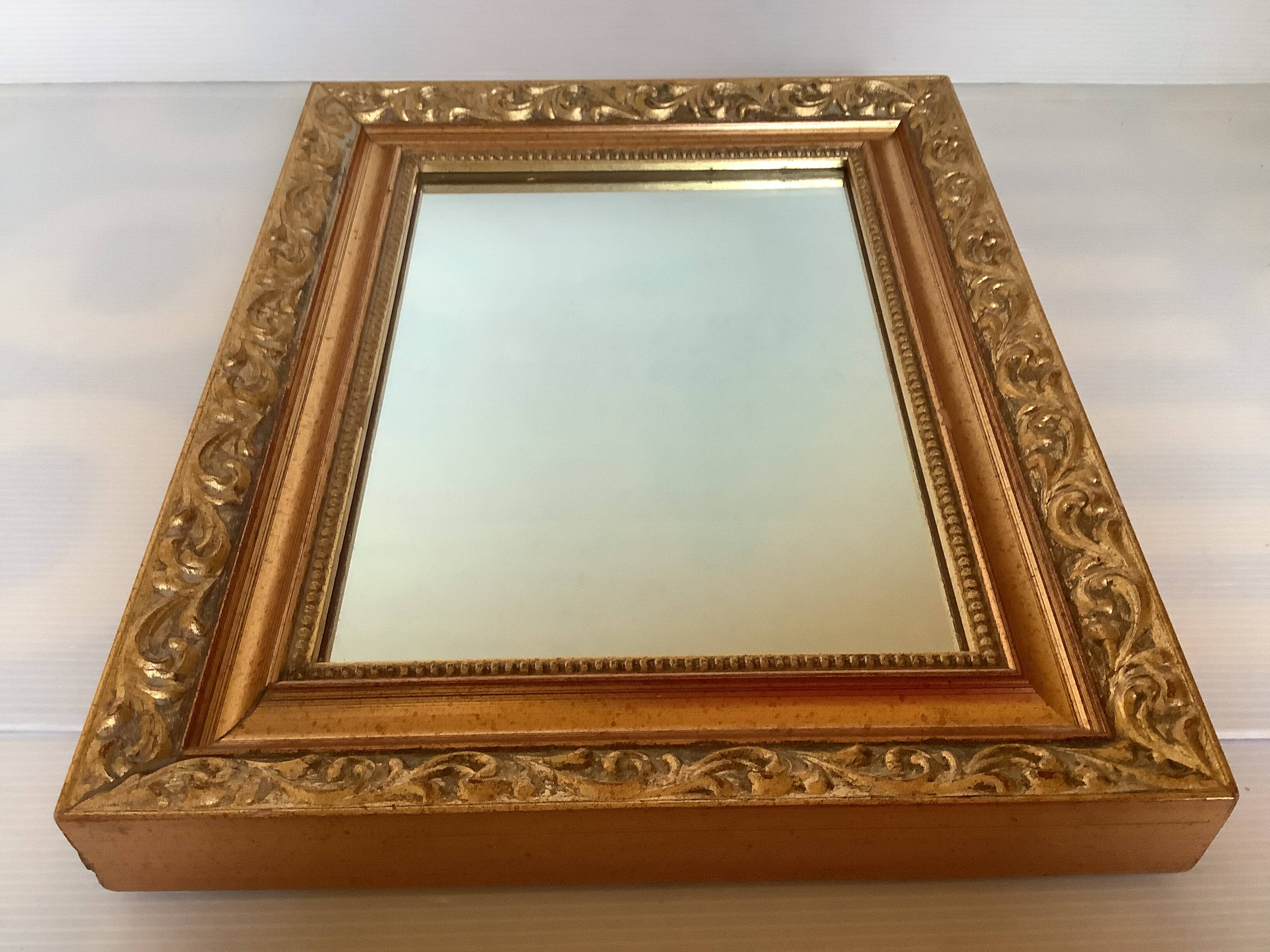 Gilded wooden beaded mirror