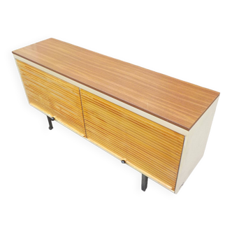 Light brown strafor sideboard with low buffet curtains