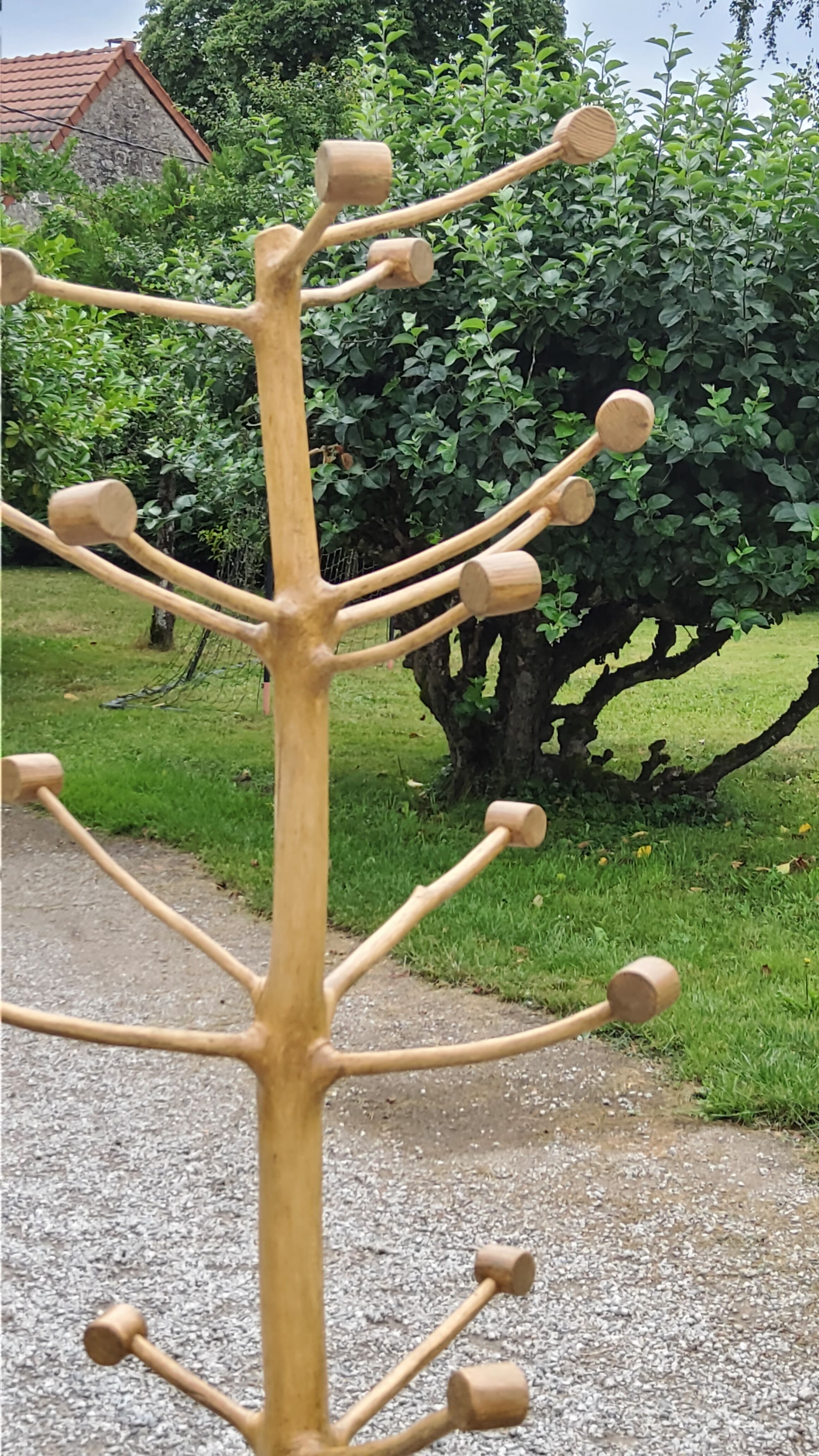 Brutalist coat rack on boxwood stand