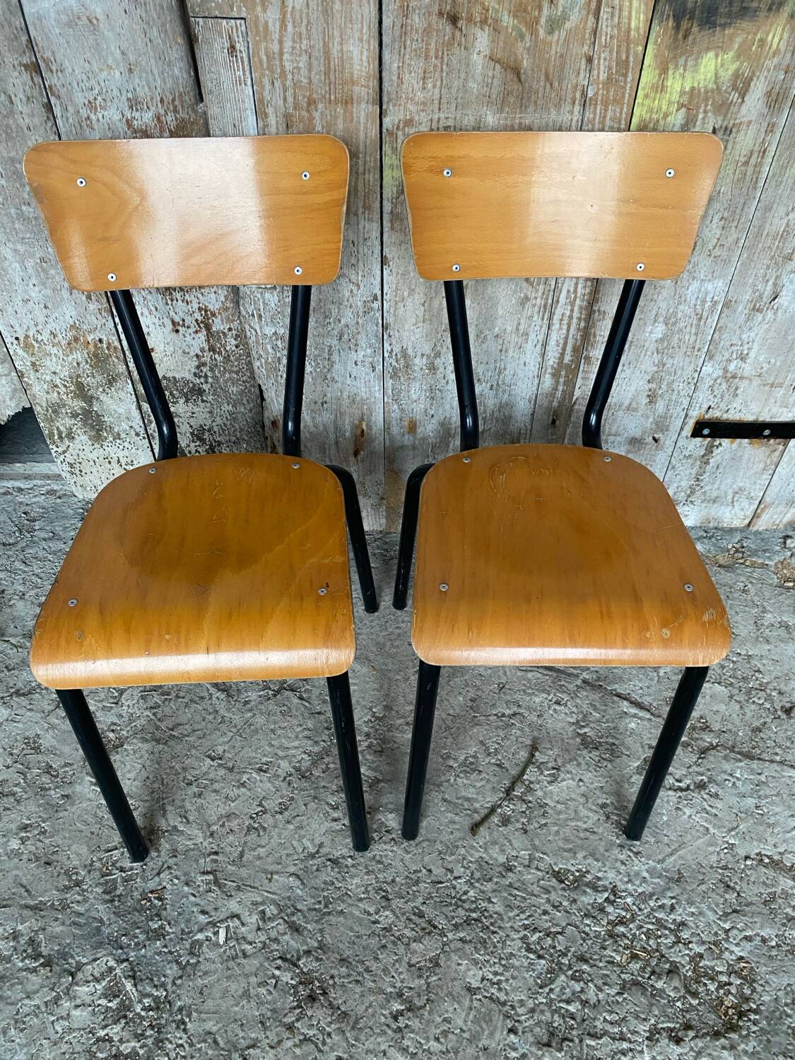 Pair of antique chairs in black metal + wooden seat & back