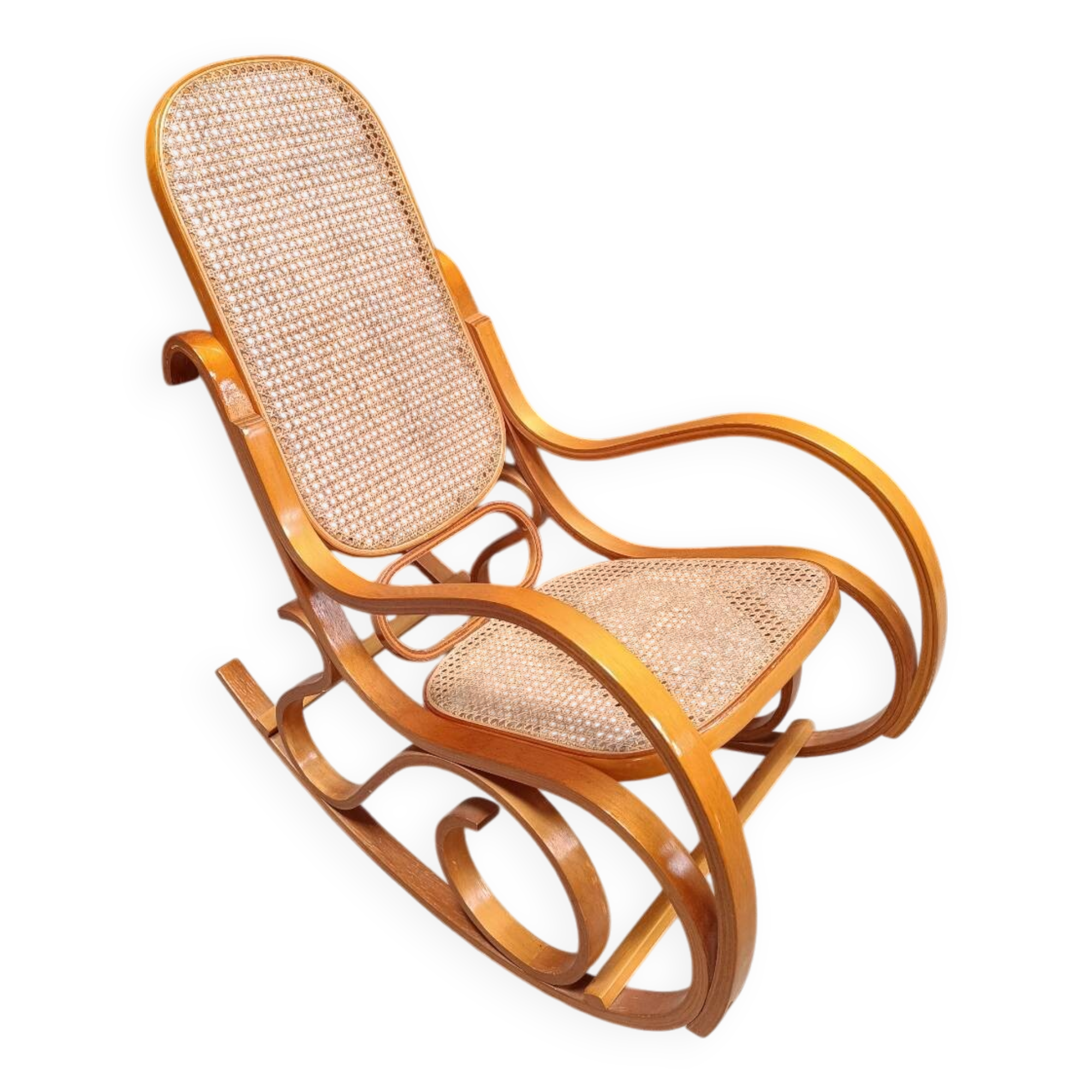 Rocking chair made of bent wood and rattan wicker.