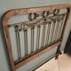 Oak and brass headboard from the 20s-30s