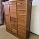 Old filing cabinet with triple curtains