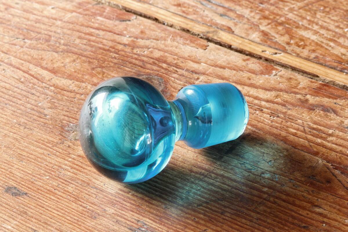 Large blown crystal bottle, twisted, turquoise blue, early 20th century.