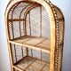 Rattan shelf on legs circa 1960